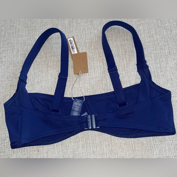 4. SKIMS Sculpting Swim Ruched Top - Picture 4 of 7